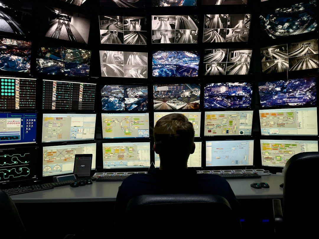 Analyst monitoring agentic AI runtime activity across multiple screens